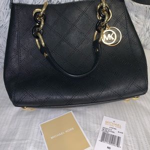 Michael Kors crossbody bag Great Condition w/ tags